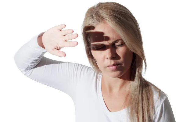 Photophobia. Woman protects her eyes from bright light with your — Stock Photo, Image