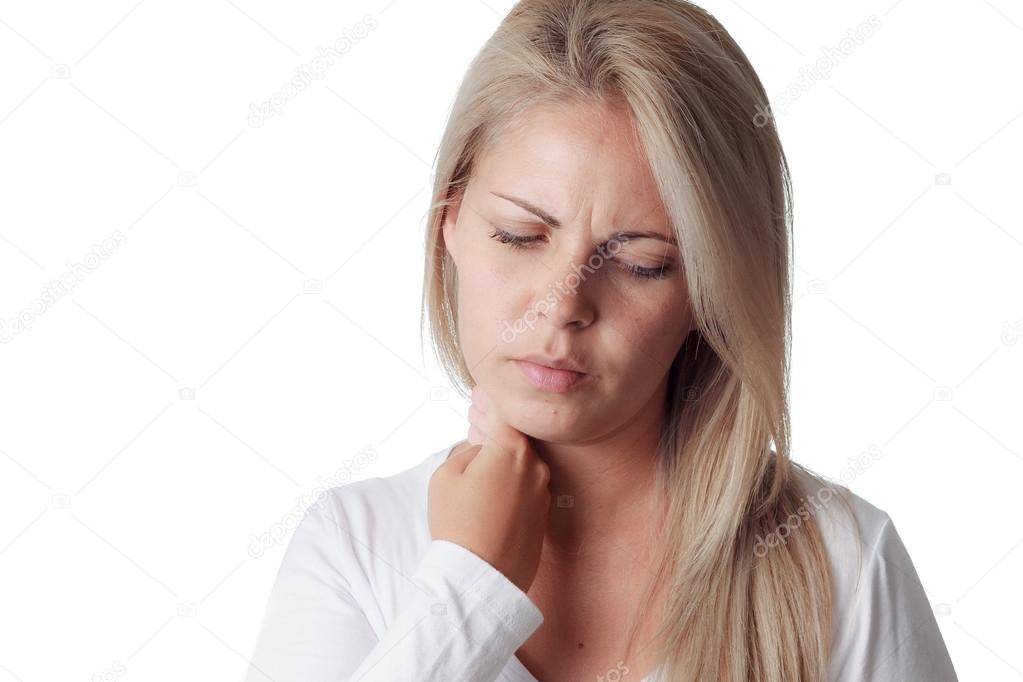 Woman checks fever with hand on neck isolated on a white backgro