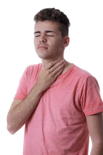 Νέος άνθρωπος που κρατά το λαιμό που απομονώνονται σε λευκό φόντο. πληγή ου — Φωτογραφία Αρχείου