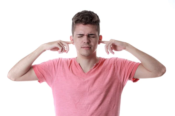 Manbeläggning hans öron med händerna — Stockfoto