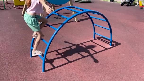 Girl Climbs Stairs Playground Arms Out Sides Balances Keeps Balance — Stock Video