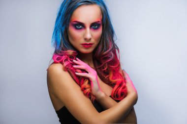 Beautiful make up, hard colors red and blue , studio 