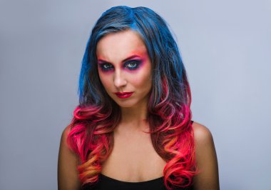 Beautiful make up, hard colors red and blue , studio 