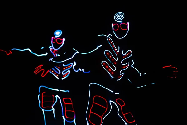 Equipo de baile en trajes de los ledes, trajes de luz — Foto de Stock