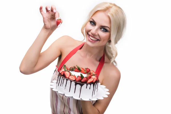 Portrait of beautiful smiling woman with cake in hand — Stock Photo, Image