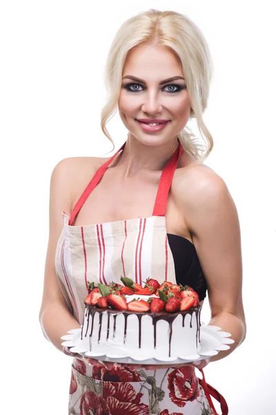 Portrait of beautiful smiling woman with cake in hand — Stock Photo, Image