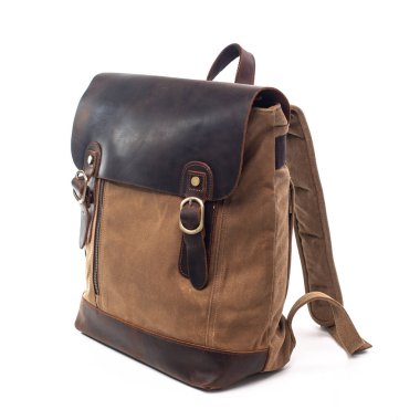 Kanvas sırt çantası aksesuarları beyaz arkaplanda izole edilmiş. Gezginler için el yapımı sırt çantası..