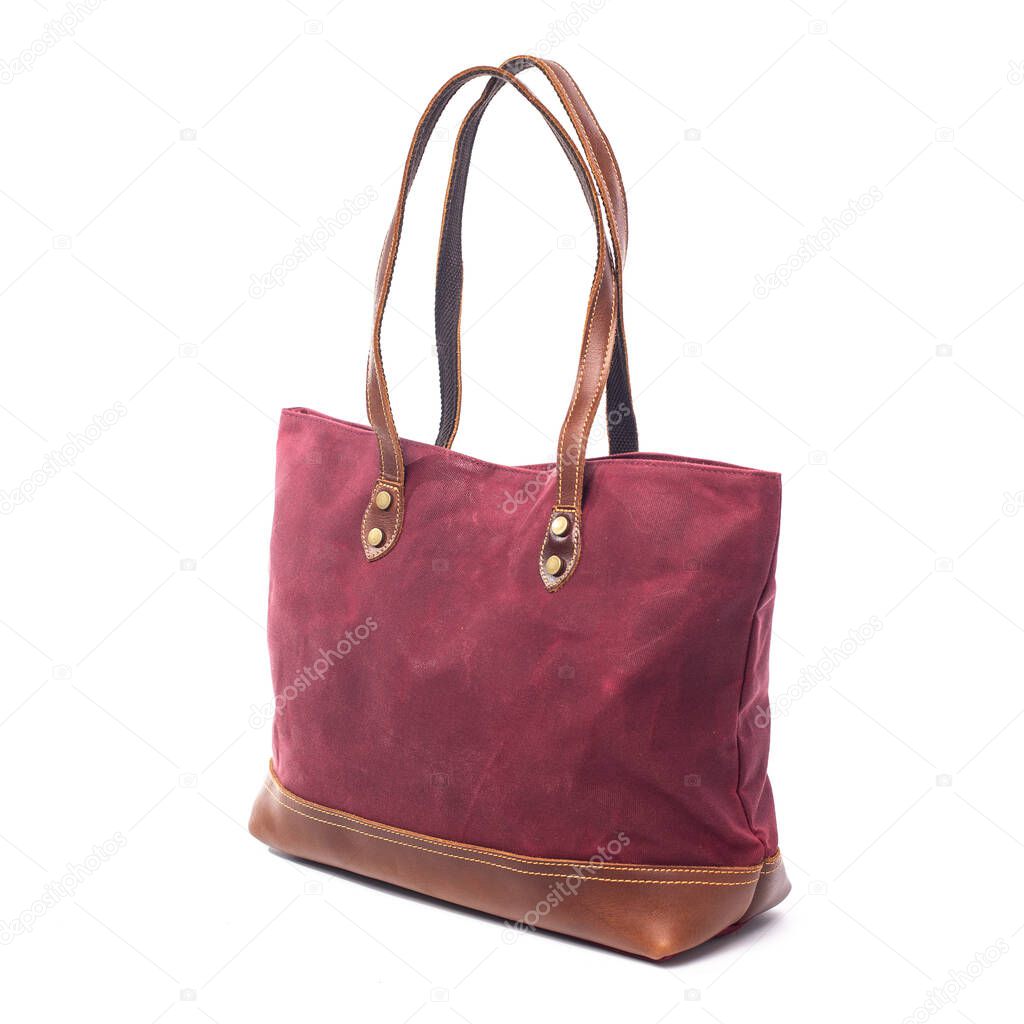 Red womans canvas bag on a white background