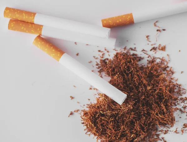 Cigarettes and tobacco. Tobacco use is a risk factor for many diseases, especially those affecting the heart, liver, and lungs, as well as many cancers.