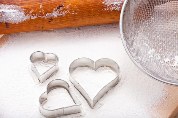 Cookie cutters and rolling pin — Stock Photo, Image