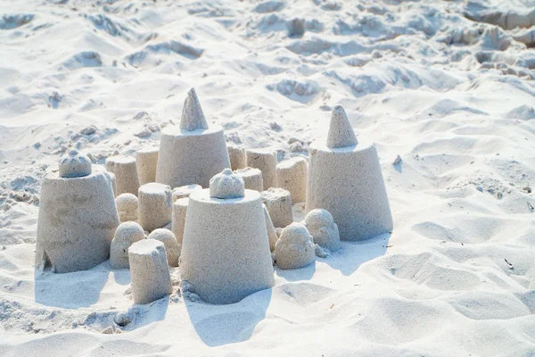 Small sand castle with copy space — Stock Photo, Image