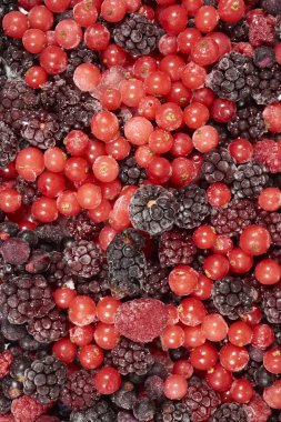 Background of many frozen berry fruits