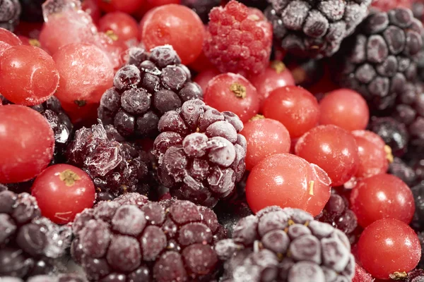 Fondo de muchas frutas de bayas congeladas —  Fotos de Stock