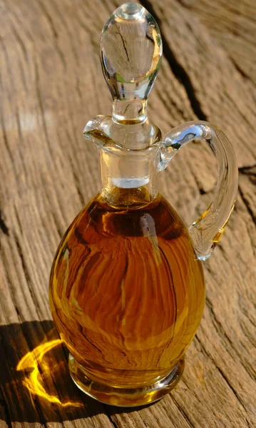 Glass bottle with olive oil — Stock Photo, Image