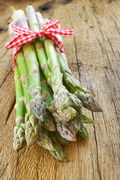Bunch fresh asparagus on — Stock Photo, Image