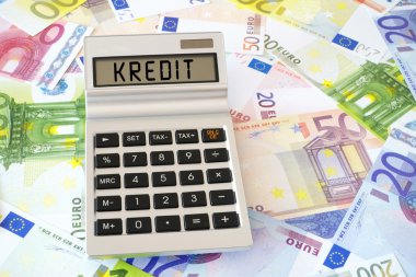 The word Credit on Calculator display