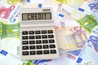The word Credit on Calculator display
