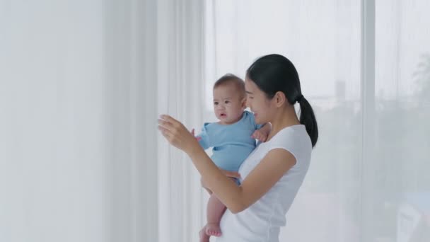 Family Concept Resolution Asian Mom Holding Baby House — Stock Video