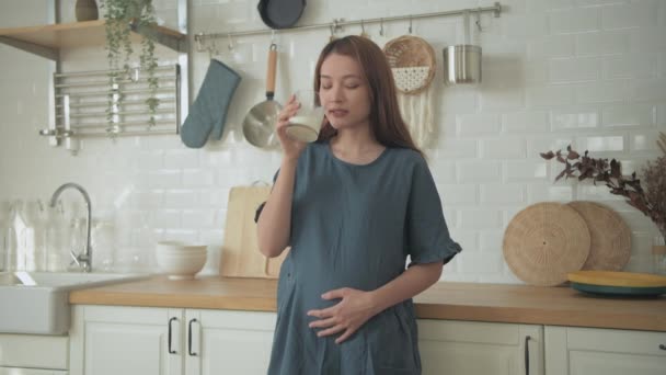 Pregnant Woman Concept Resolution Asian Girls Drinking Milk Kitchen — Stock Video