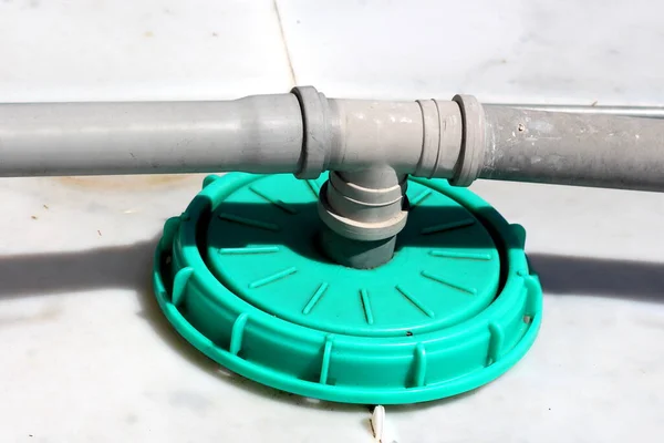 Grey Dilapidated Old Plastic Pipes Connected Large Light Green Cap — Stockfoto
