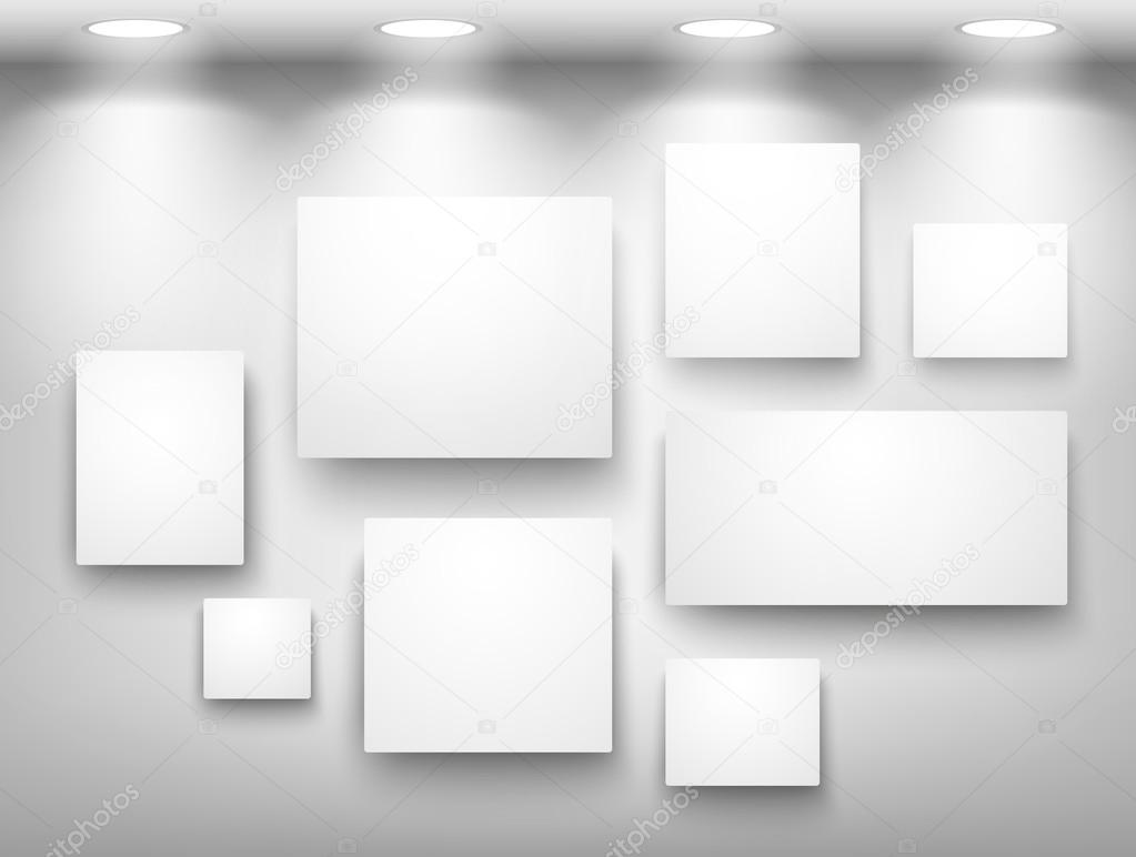 Gallery of empty frames on wall