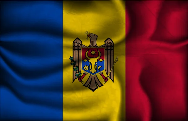 Skrynkliga flagga Moldavien på en ljus bakgrund — Stock vektor