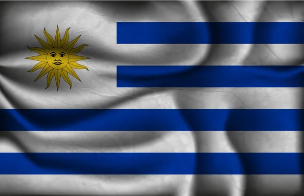Skrynkliga flagga Uruguay på en ljus bakgrund — Stock vektor