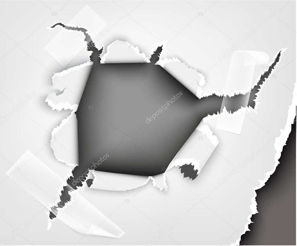 torn paper hole in sheet