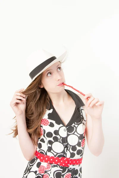 Girl with red licorice — Stock Photo, Image