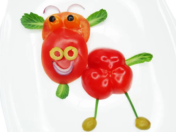 Aperitivo vegetal divertido creativo con tomate —  Fotos de Stock