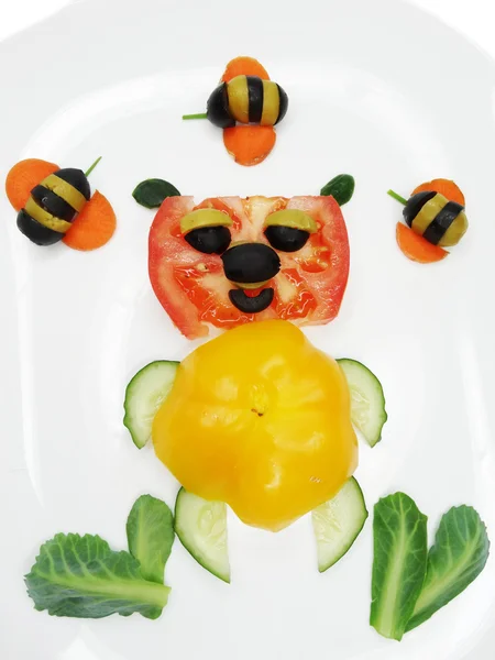 Creative funny vegetable snack with tomato — Stock Photo, Image