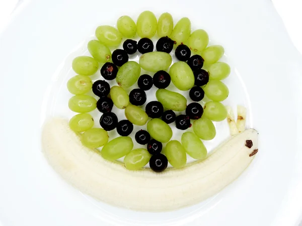 Postaci ślimak deser dziecko twórcze owoców — Zdjęcie stockowe