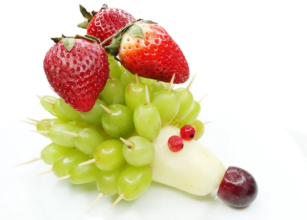 Creative fruit child dessert hedgehog form — Stock Photo, Image