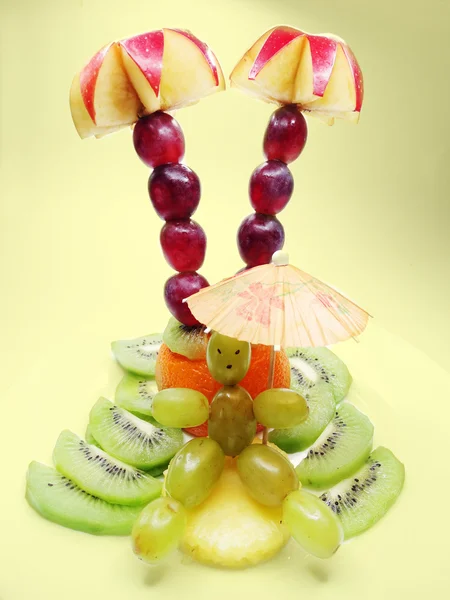 Creative fruit child dessert man sunbathing form — Stock Photo, Image