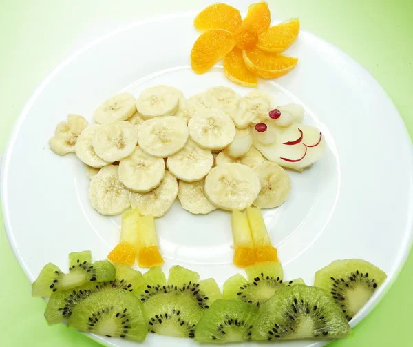 Creative fruit child dessert ship form — Stock Photo, Image