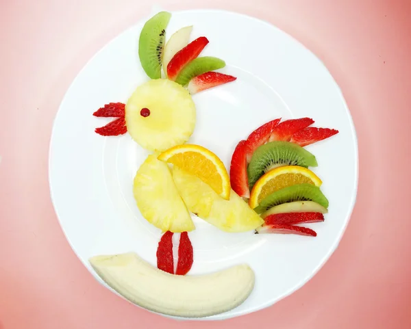 Creative fruit child dessert bird form — Stock Photo, Image