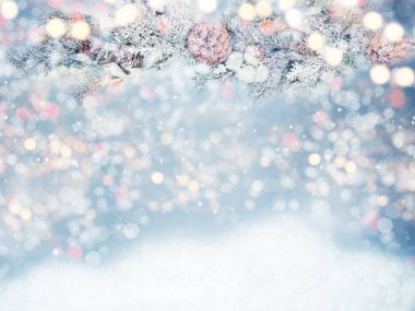 Kış Noel arkaplanı köknar dalları koniler ve kar çelengi ışıkları