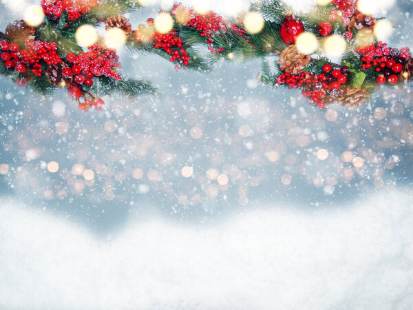 winter christmas background with fir branches cones and snow garland lights