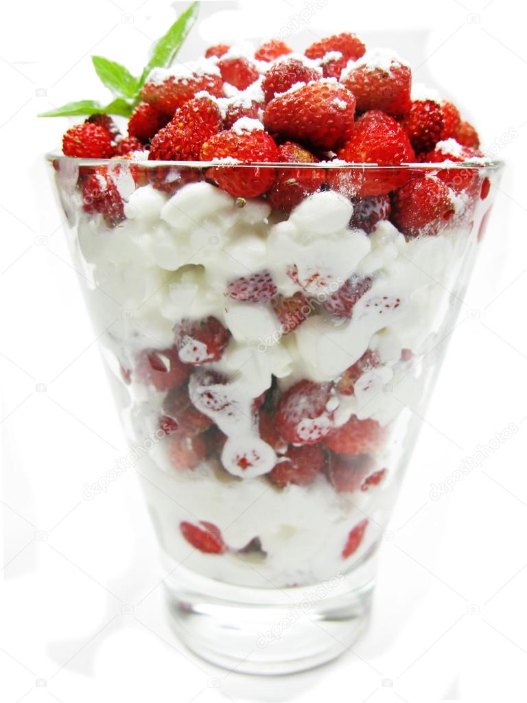 dairy pudding dessert with wild strawberry berries