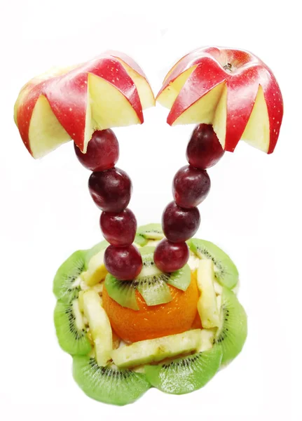 Creative fruit child dessert palm trees on the island form — Stock Photo, Image
