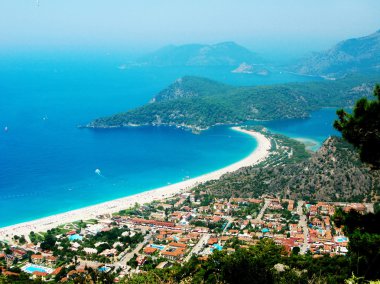 landscape of oludeniz lagoon beach in the mediterranean sea turk clipart