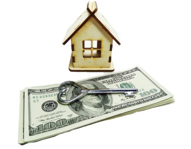 Evin minyatür anahtarı el para tasarruf kavramı içinde