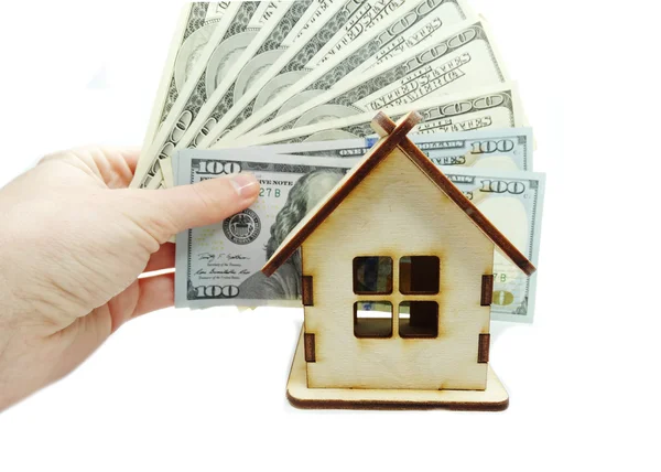 Мініатюра будинку в руці концепція заощадження грошей — стокове фото