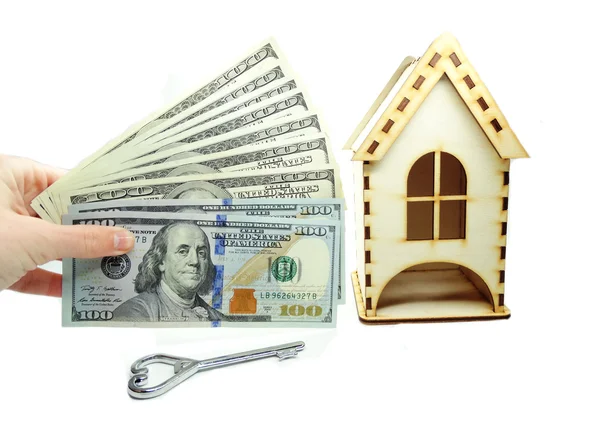 House miniature key in hand money savings concept — Stock Photo, Image