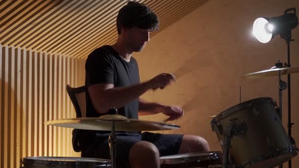 Drummer playing his drum kit on concert. Drummer recording drum sounds — Stock video