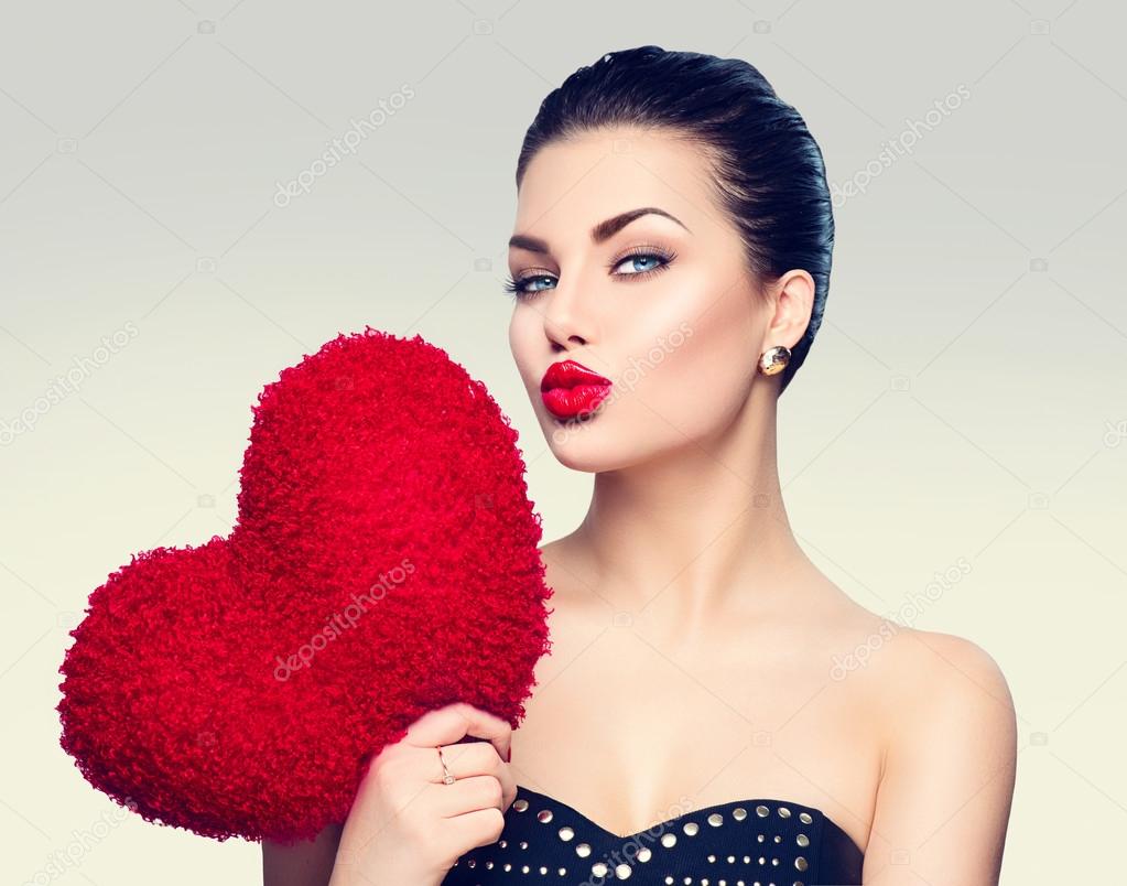 young brunette woman with heart