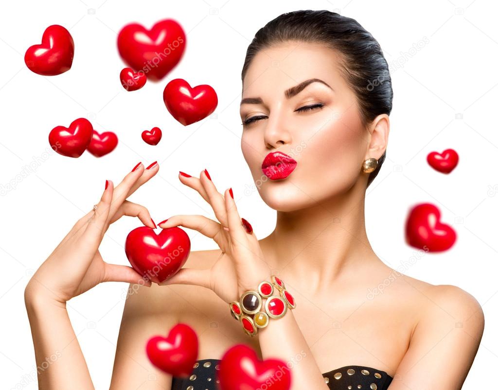 woman showing red heart