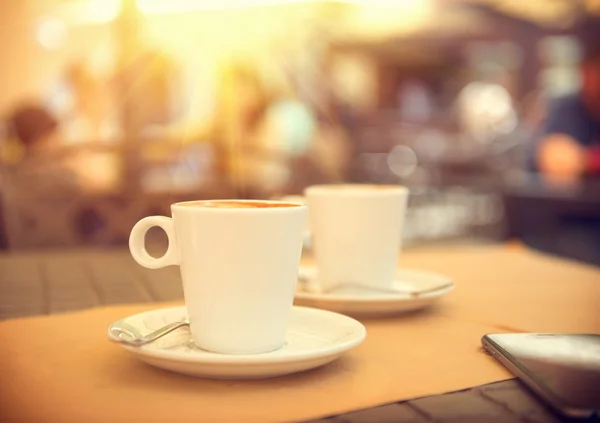 Morning coffee on the terrace in cafe.