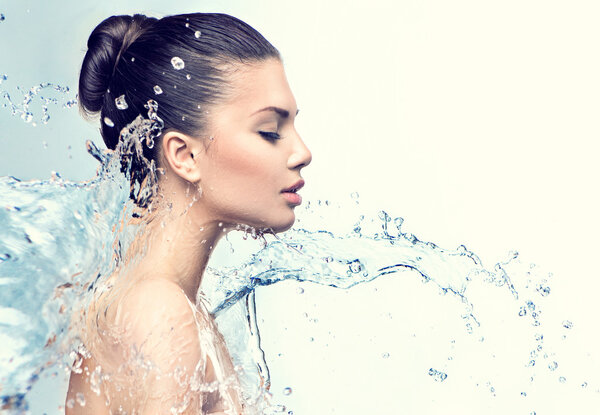 Woman with splashes of water