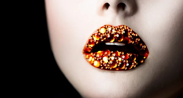 Lippen mit Edelsteinen. — Stockfoto